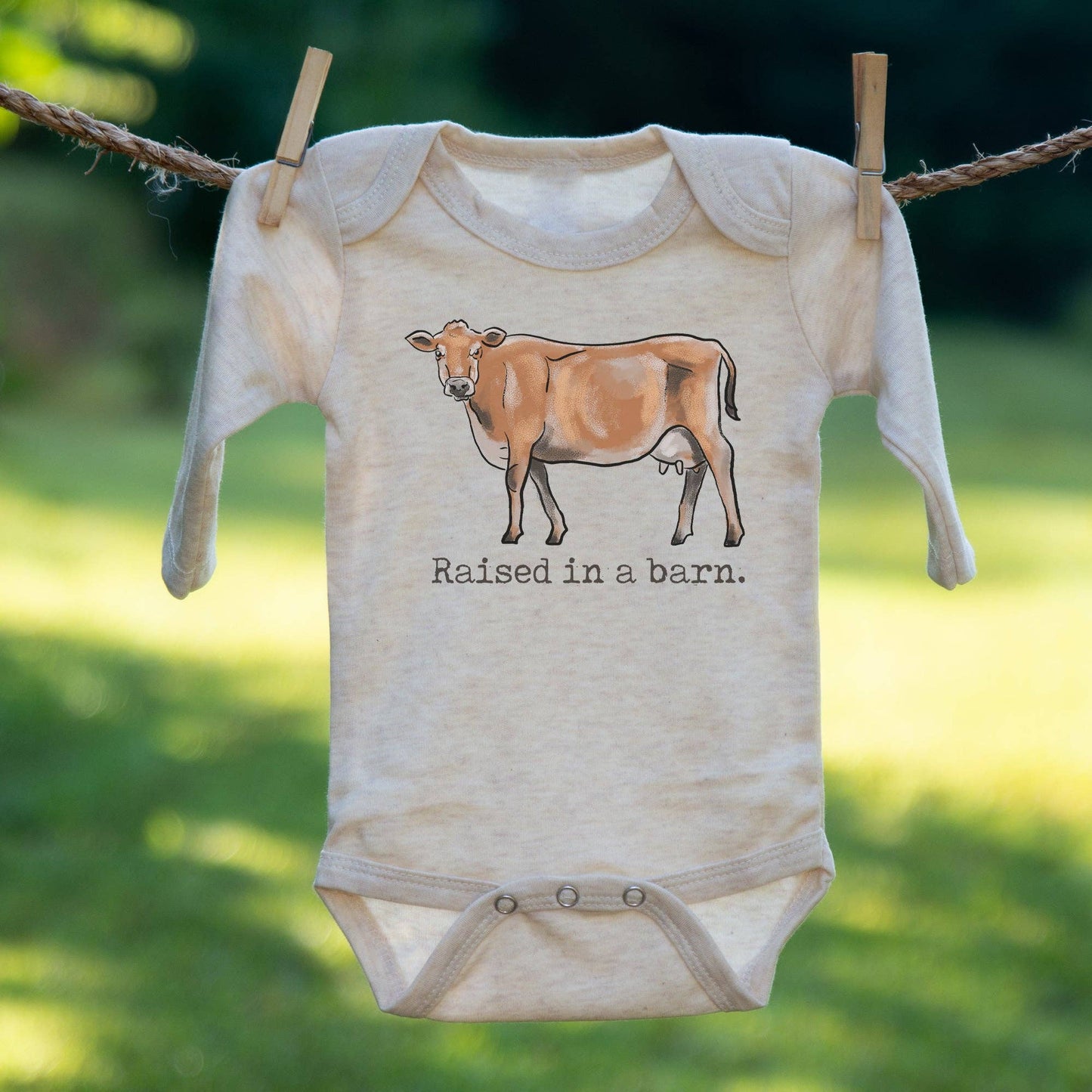 Raised in a Barn Country Western Baby Onesie [Natural]