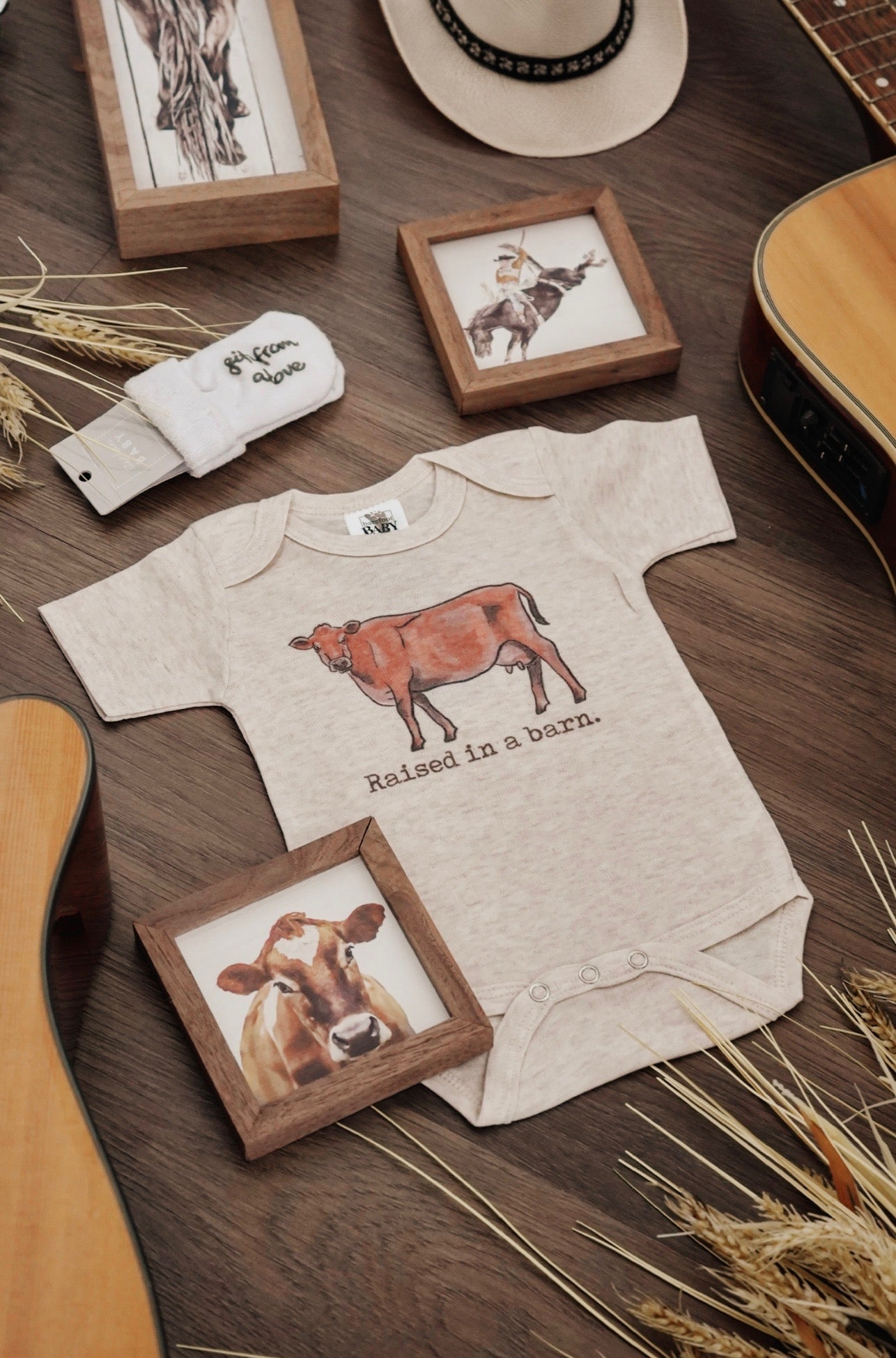 Raised in a Barn Country Western Baby Onesie [Natural]
